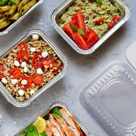 Nicole Home Collection cake containers with lids for easy serving and storage.