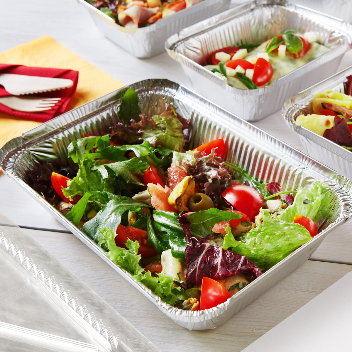 Nicole Home Collection to-go containers with lids for catering and safe transport.