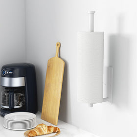 Niffgaff paper towel holder with drilled mounting for secure under-cabinet installation.