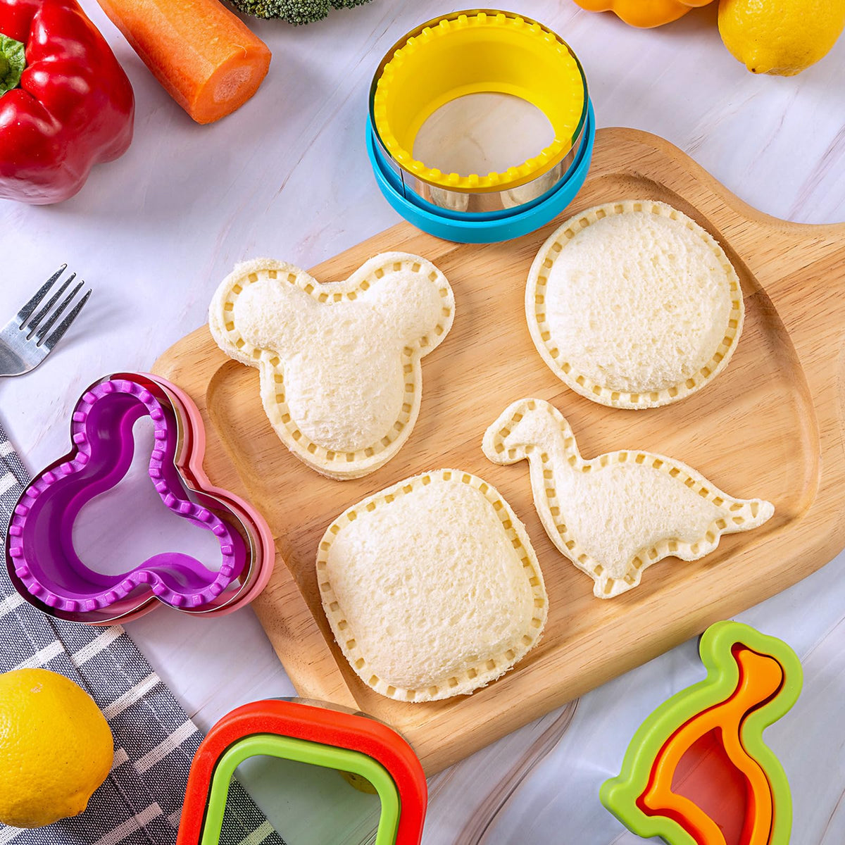 Nifogo cookie cutters with circle, square, Mickey, and dinosaur shapes for themed lunches.