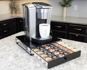 Nifty Solutions drawer opened to reveal 36 pod capacity and easy access.