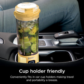 Ninja Blast stainless steel blades blasting through ice for smooth drinks.