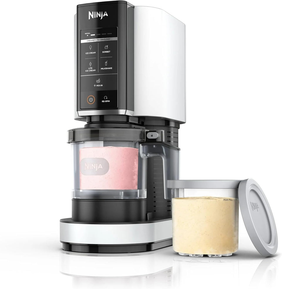 Ninja CREAMi ice cream maker in white on a counter for smooth frozen desserts
