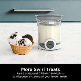 Ninja Swirl storage lids close-up showing reusable design for keeping flavors fresh.