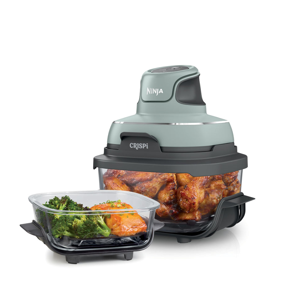 Ninja Crispi PowerPod portable air fryer in hand for quick meals