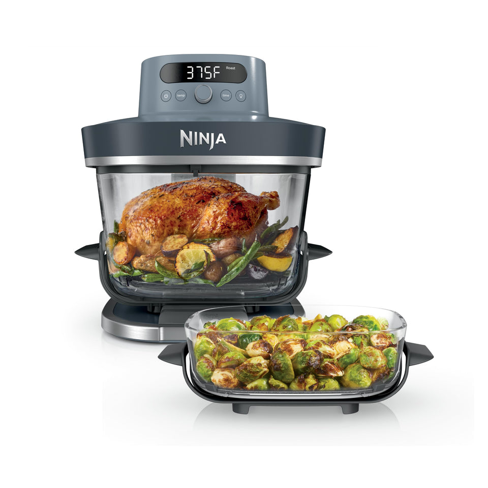 Ninja Crispi Pro glass air fryer on countertop for quick family meals.