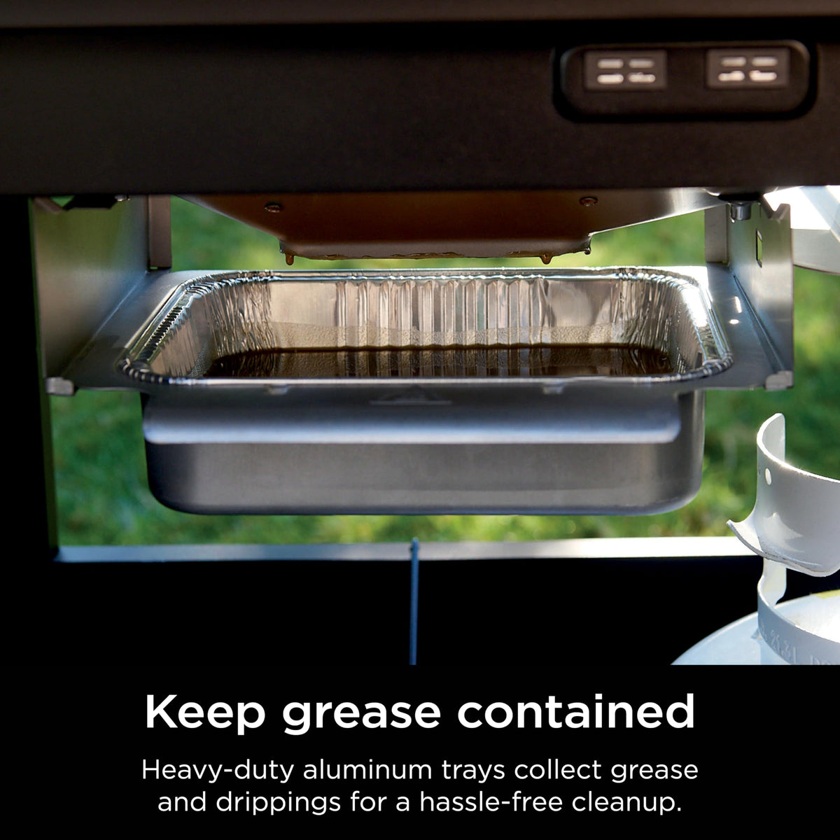 Ninja FlexFlame durable aluminum tray capturing drips during cooking