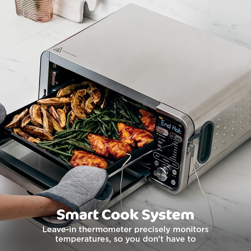 Ninja Foodi dual-heat inside cavity demonstrates roomy cooking space for batches.