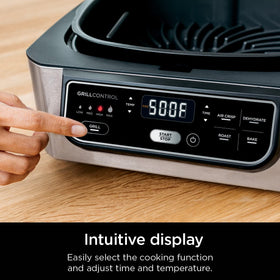 Ninja Foodi Indoor Grill includes grill grate, crisper basket, and pot.