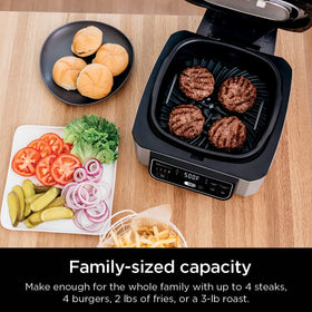 Ninja Foodi Indoor Grill on a countertop illustrating compact power.
