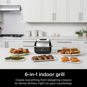 Ninja Foodi Indoor Grill cyclonic air seals in flavors with less oil.