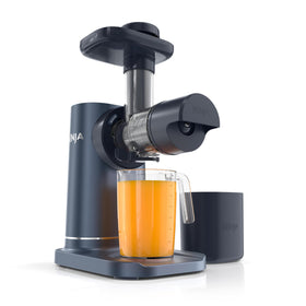 Ninja NeverClog navy juicer on countertop ready for daily juicing