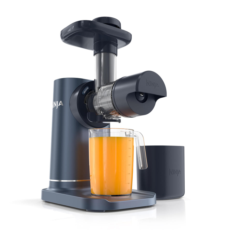 Ninja NeverClog navy juicer on countertop ready for daily juicing