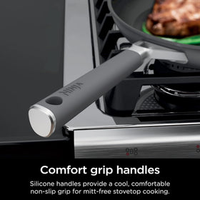 Ninja NeverStick Pro exterior close-up highlighting durable hard‑anodized finish.