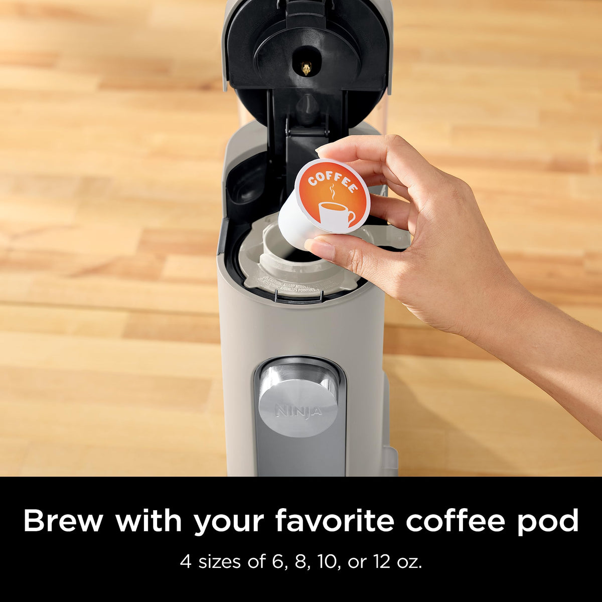 Ninja PB041ST with a 24-ounce travel mug highlighting travel readiness.