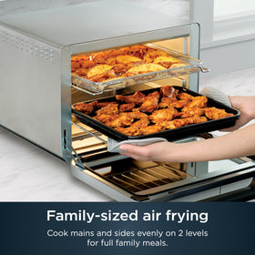 Ninja Prestige Smart XL interior with racks shows large capacity for cookies and roasts.