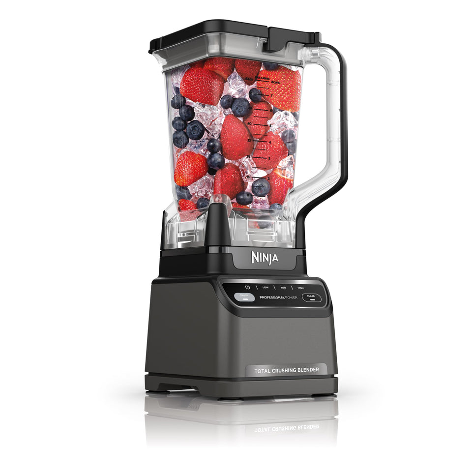 Ninja Professional Blender 1200W base powering through tough ingredients for smooth results.