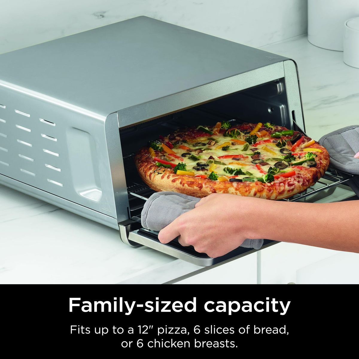 Ninja Removable Crumb Tray for quick cleanup after cooking.
