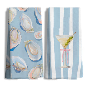 Nipil coastal oyster shell towels provide seaside style for kitchen tasks.