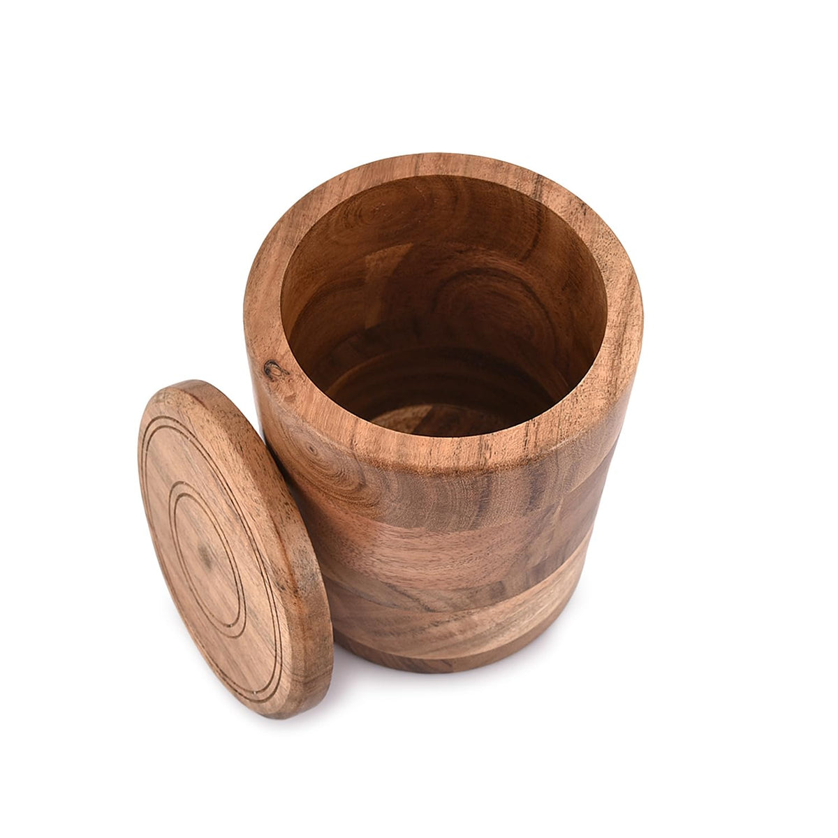 NIRMAN Acacia wood round storage jar on a kitchen counter complements retro decor.