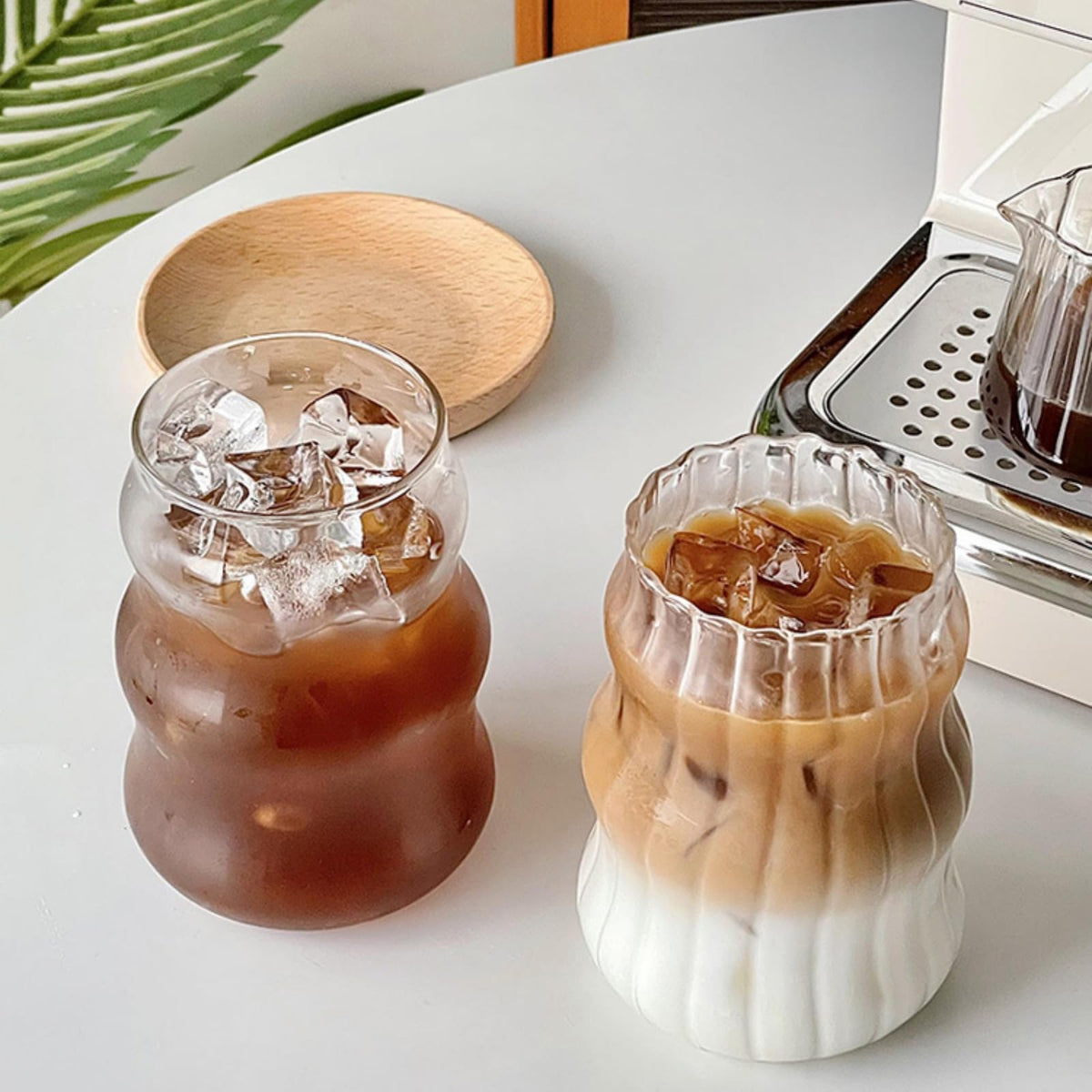 Nirvany ribbed glass cups with wave design, 18oz, ideal for cold beverages and grip.
