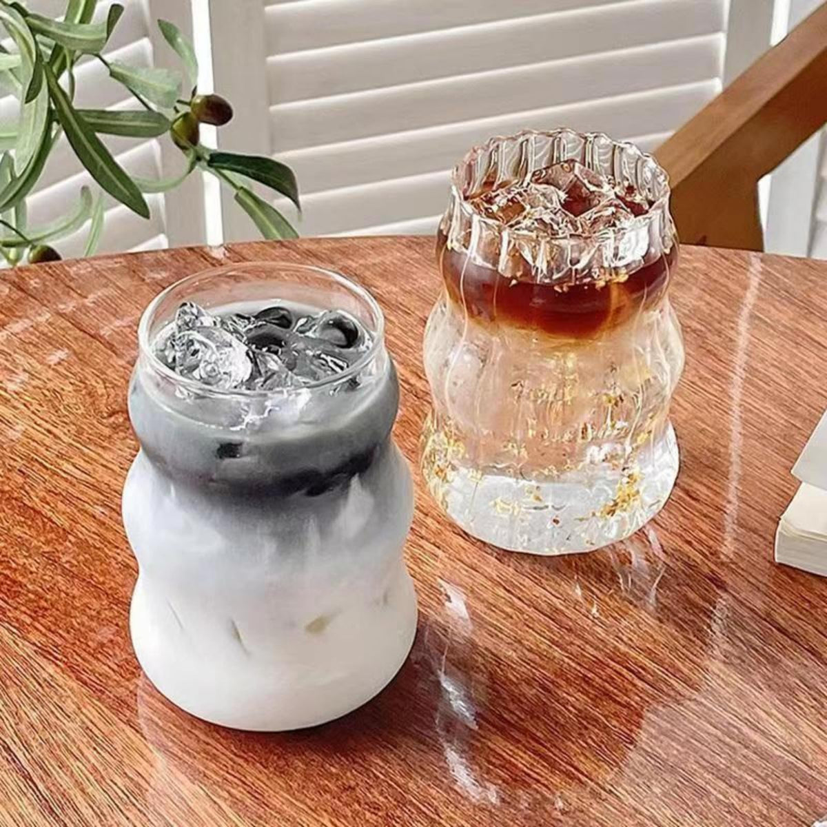 Nirvany vintage-inspired ribbed glass cup, 18oz, adds retro charm to drinks.