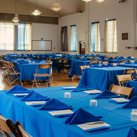 Niuara blue disposable table cover roll ready for quick cleanup.