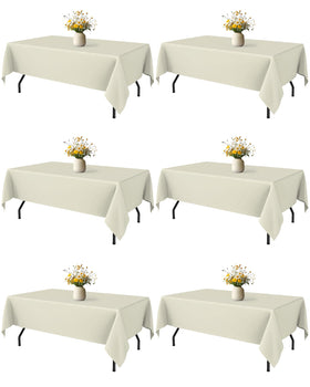 Niuara Ivory rectangle tablecloth on a 5ft table for a polished wedding setup