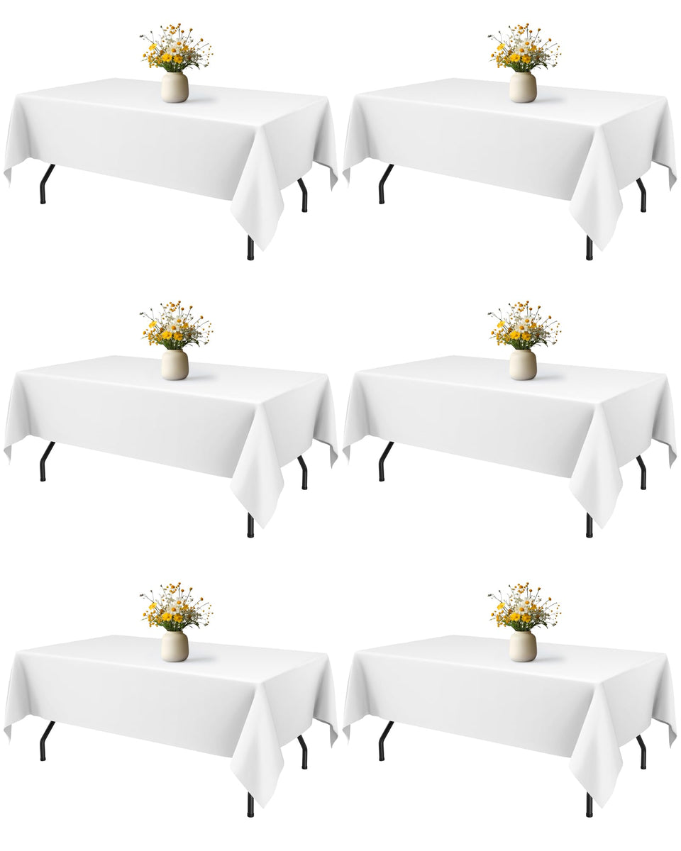 Niuara white rectangle table cloth draped on table for a clean, elegant look.