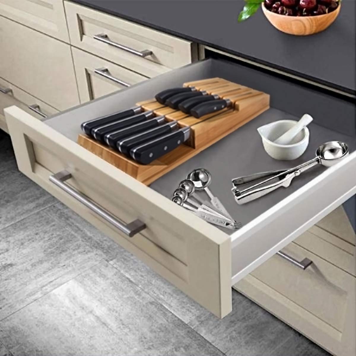 NIUXX in-drawer organizer keeps countertops clutter-free with removable slots