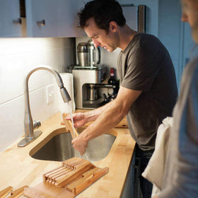 NIUXX in-drawer organizer showing tidy kitchen tool storage solution