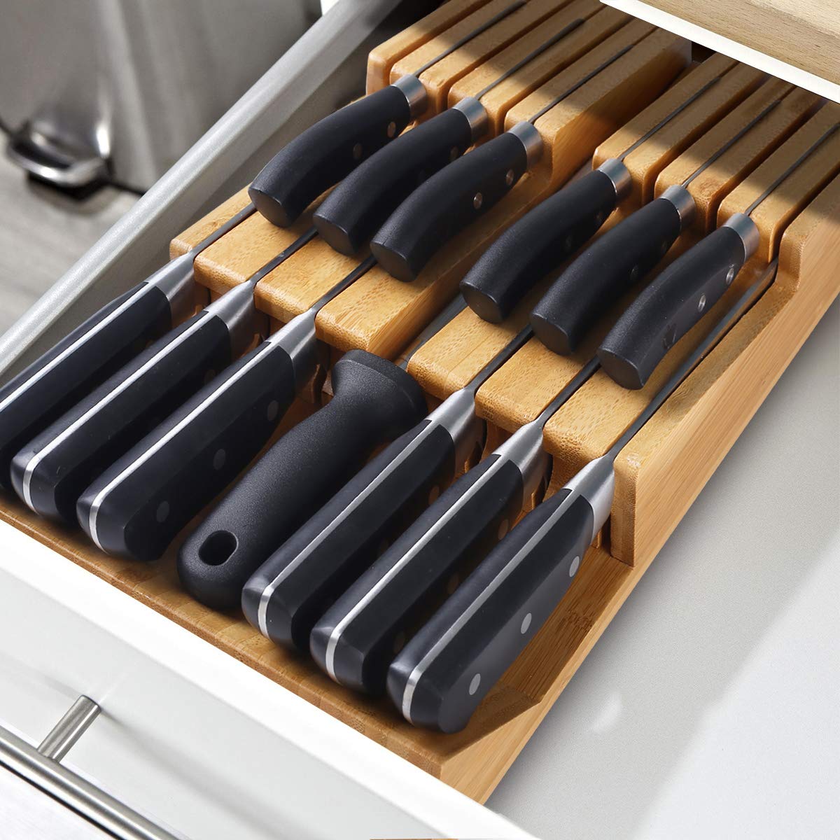 NIUXX built-in knife sharpener slot adds convenient edge maintenance.