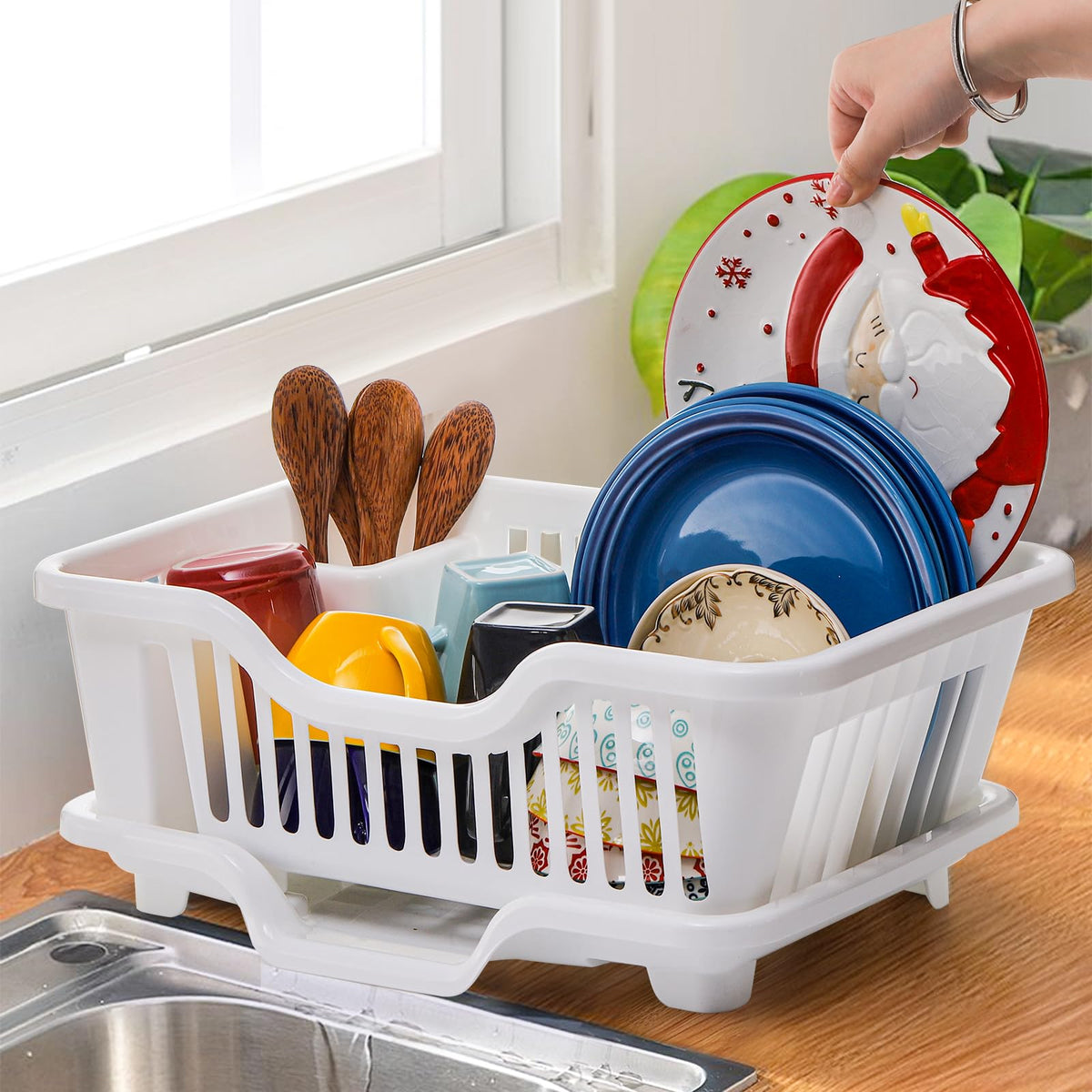 Noamus counter-top organizer frees space by sitting over the sink during busy mornings.