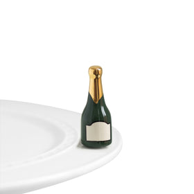 Nora Fleming Champagne Mini A94 front view, hand-painted charm for festive tables.