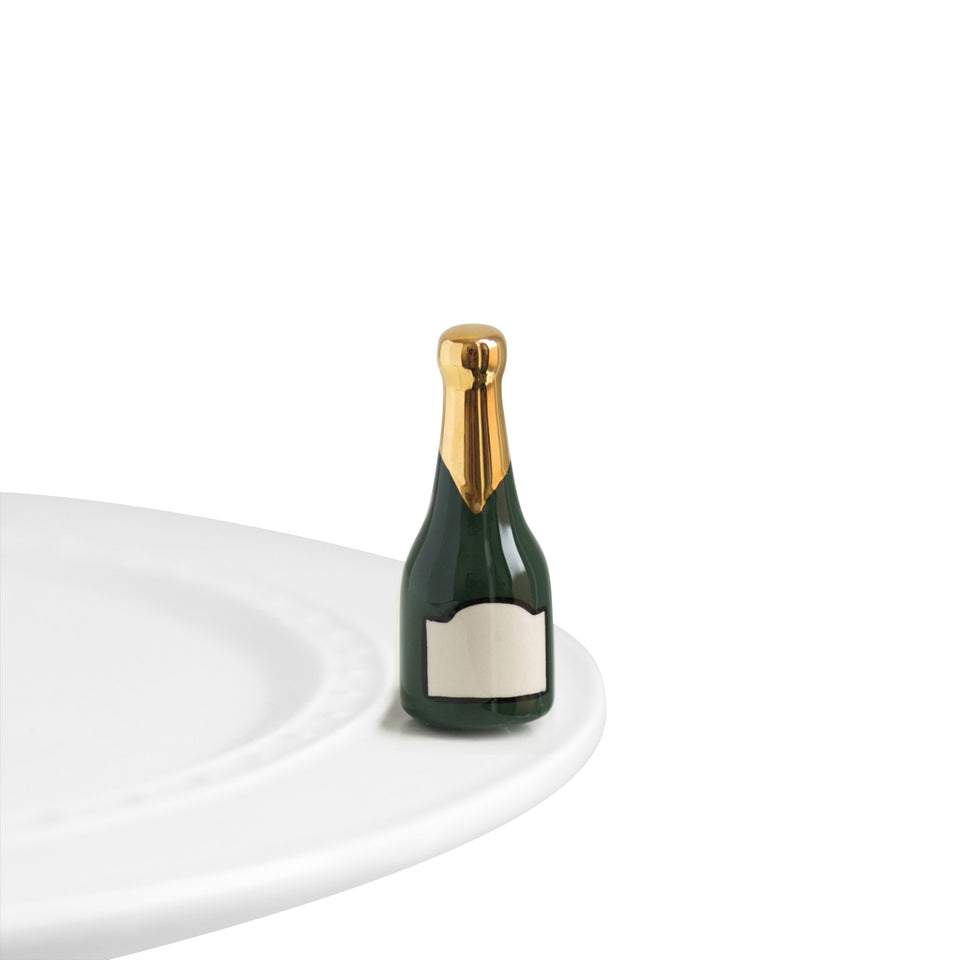 Nora Fleming Champagne Mini A94 front view, hand-painted charm for festive tables.
