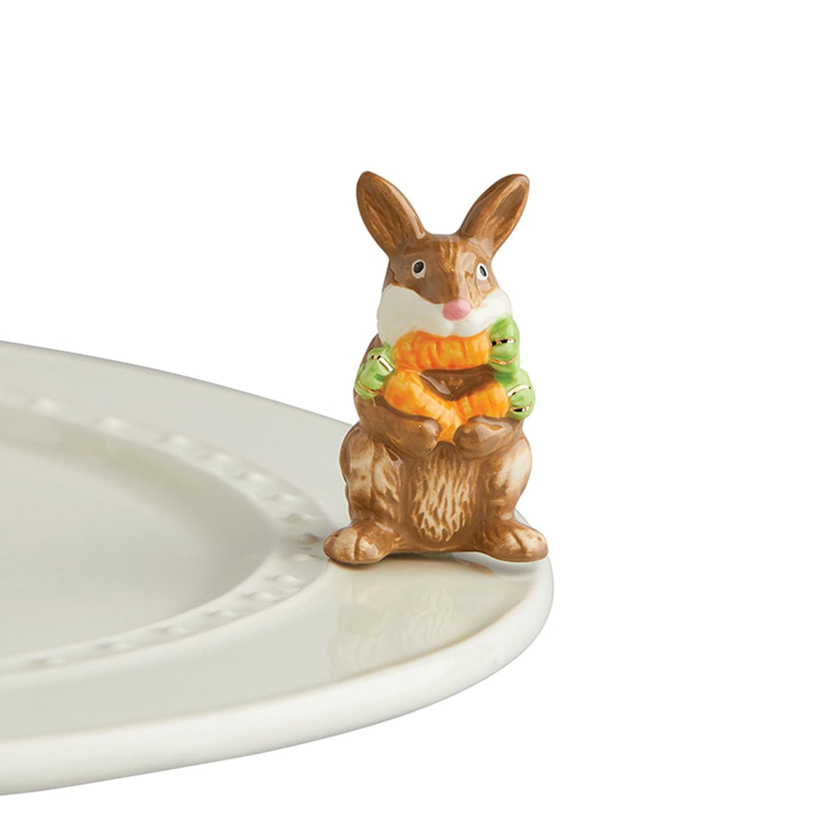 Nora Fleming Funny Bunny brown mini on tabletop adds seasonal charm