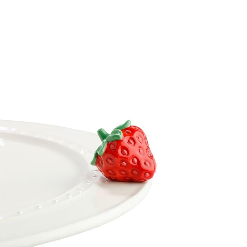Nora Fleming Juicy Fruit Strawberry mini on display for dessert-table charm