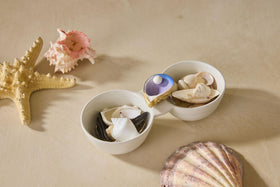 Nora Fleming Shuck Yeah oyster shell mini on a desk or shelf, ceramic detail