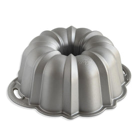 Nordic Ware Anniversary Bundt Pan 15-Cup Silver ready for even bake and crisp fluting.