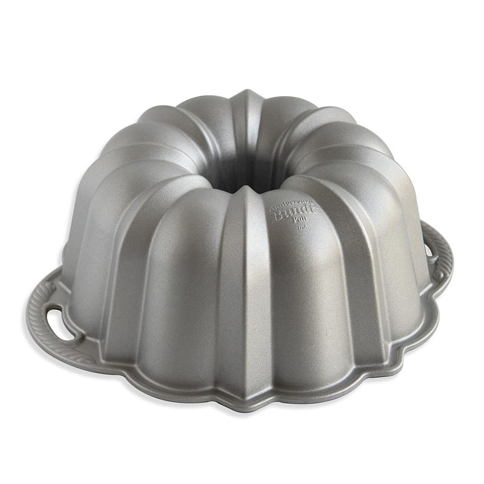 Nordic Ware Anniversary Bundt Pan 15-Cup Silver ready for even bake and crisp fluting.