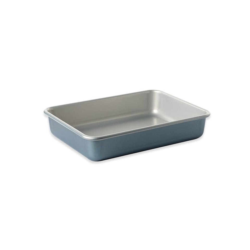 Nordic Ware Brilliant pan with blue exterior for even browning and clean release.