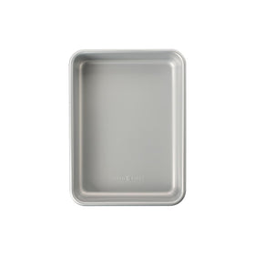 Nordic Ware Brilliant 9x13 pan, oven-safe up to 400°F for versatile cooking.