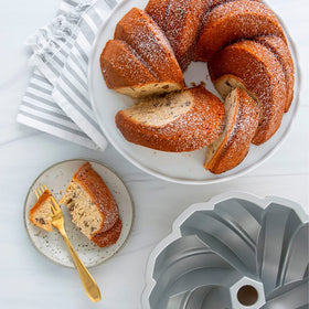 Nordic Ware Bundt cake glazed or dusted beautifully