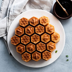Nordic Ware Bundt-style pan showing intricate detailing with even browning.