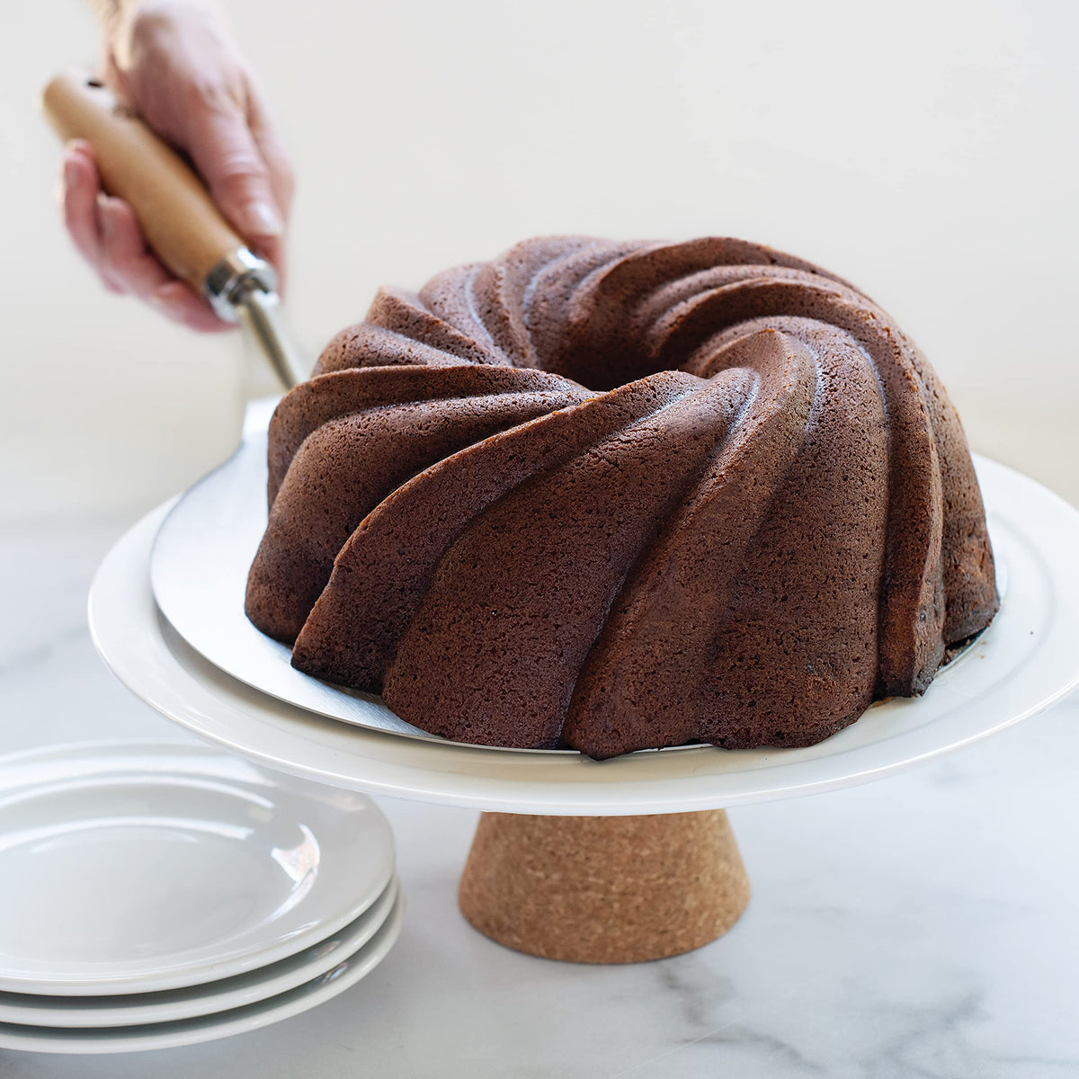 Nordic Ware Cake Lifter care guidance with hand wash recommendation for longevity