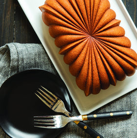 Nordic Ware cast aluminum core offers even heat for uniform browning.