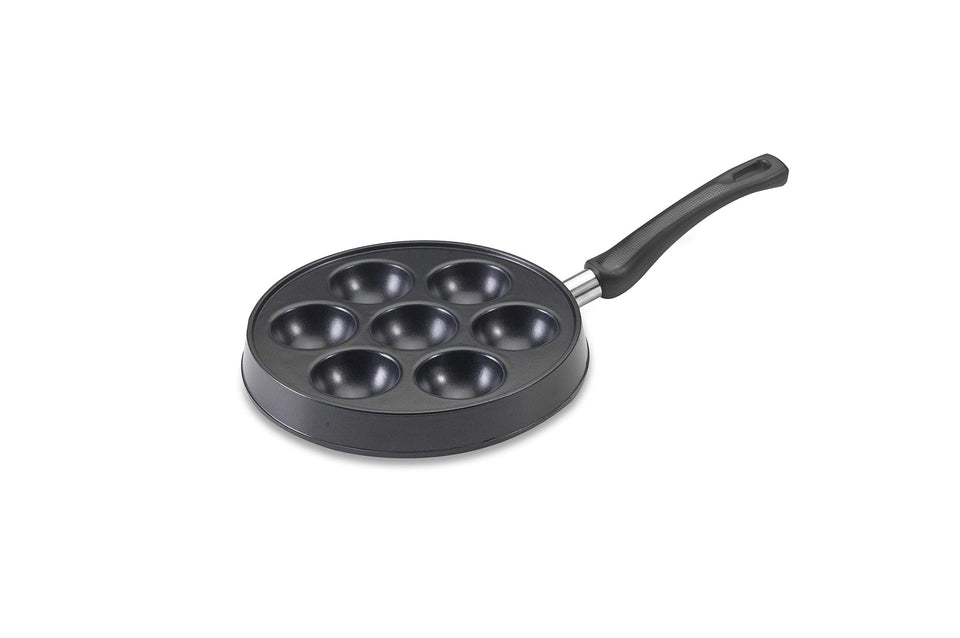Nordic Ware Danish Ebelskiver Pan on stove showing even heating for fluffy pancakes
