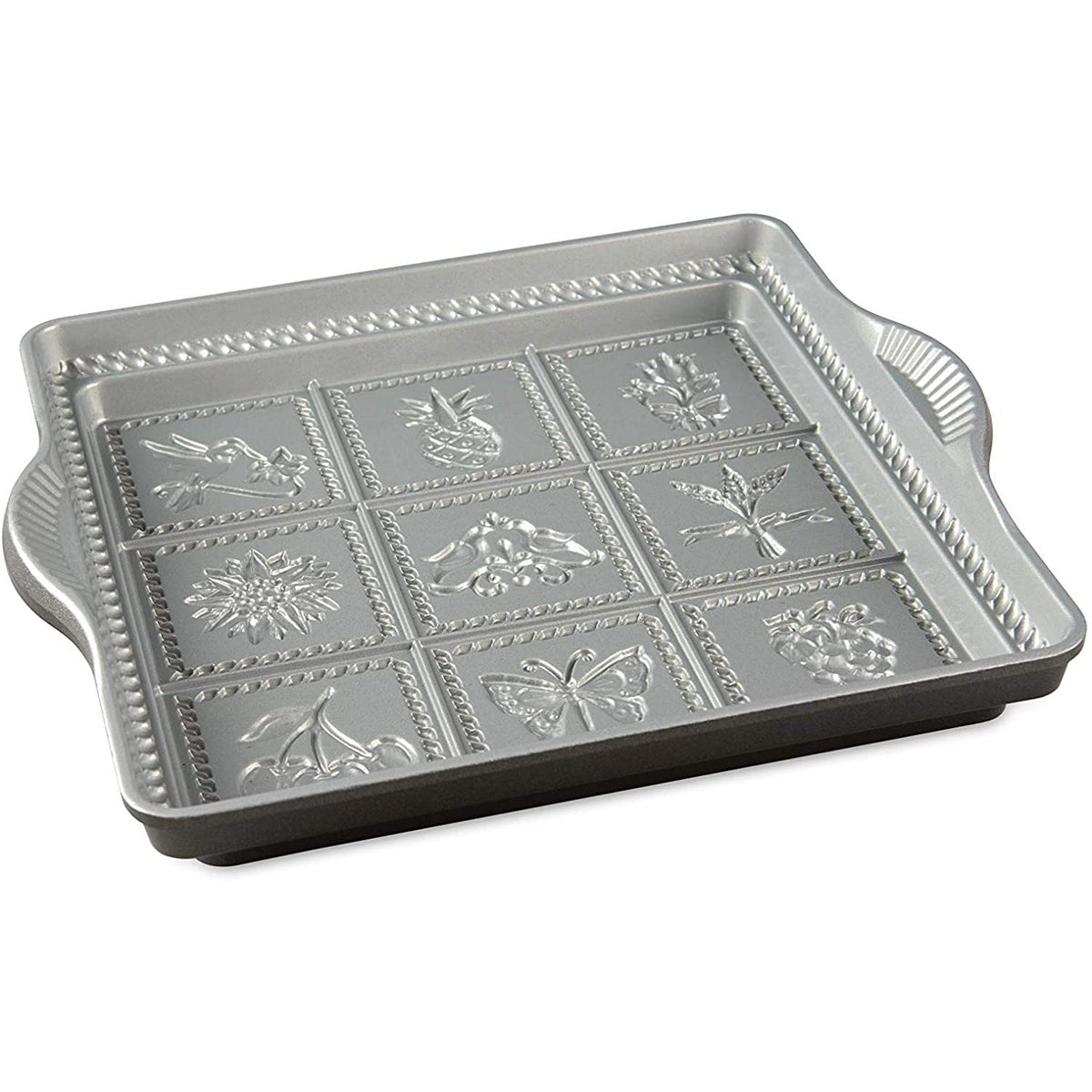 Nordic Ware English shortbread pan with nine-pattern base for decorative cookies and even baking.