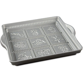 Nordic Ware English shortbread pan with nine-pattern base for decorative cookies and even baking.