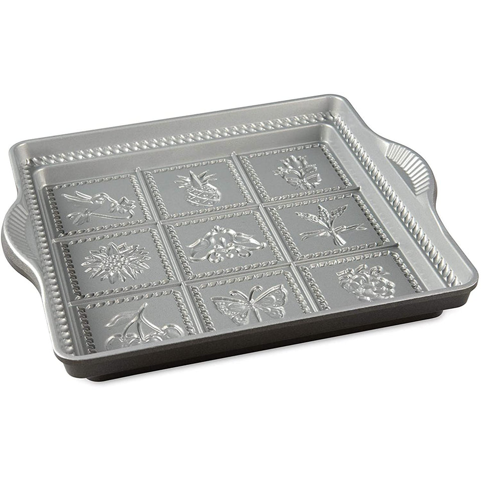 Nordic Ware English shortbread pan with nine-pattern base for decorative cookies and even baking.